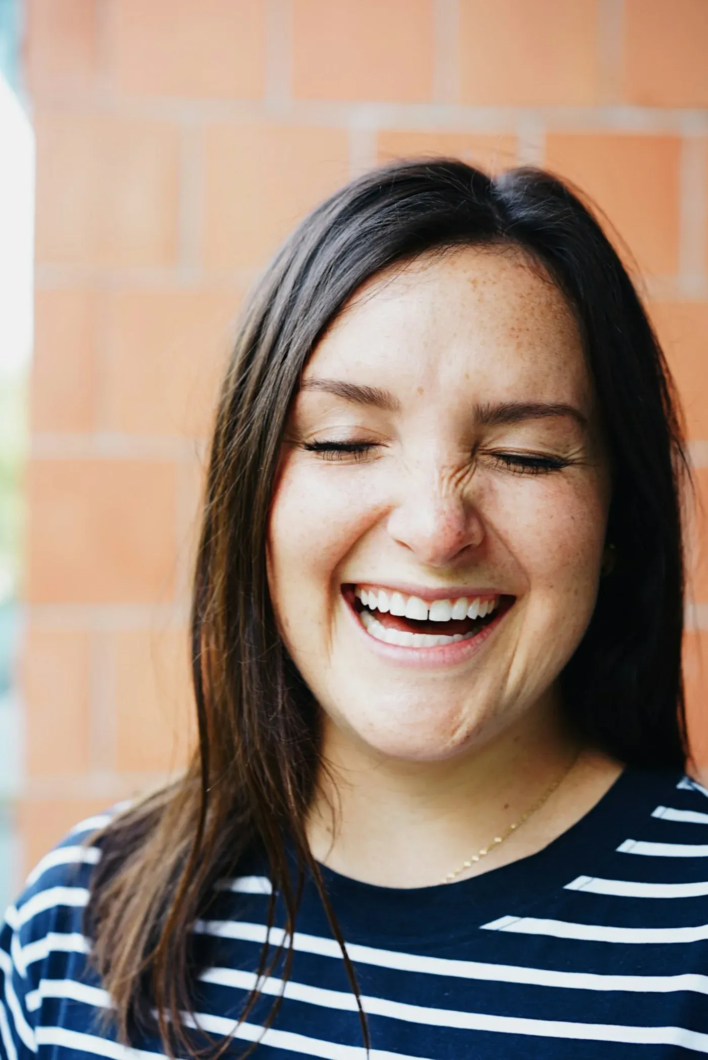 Young woman laughing