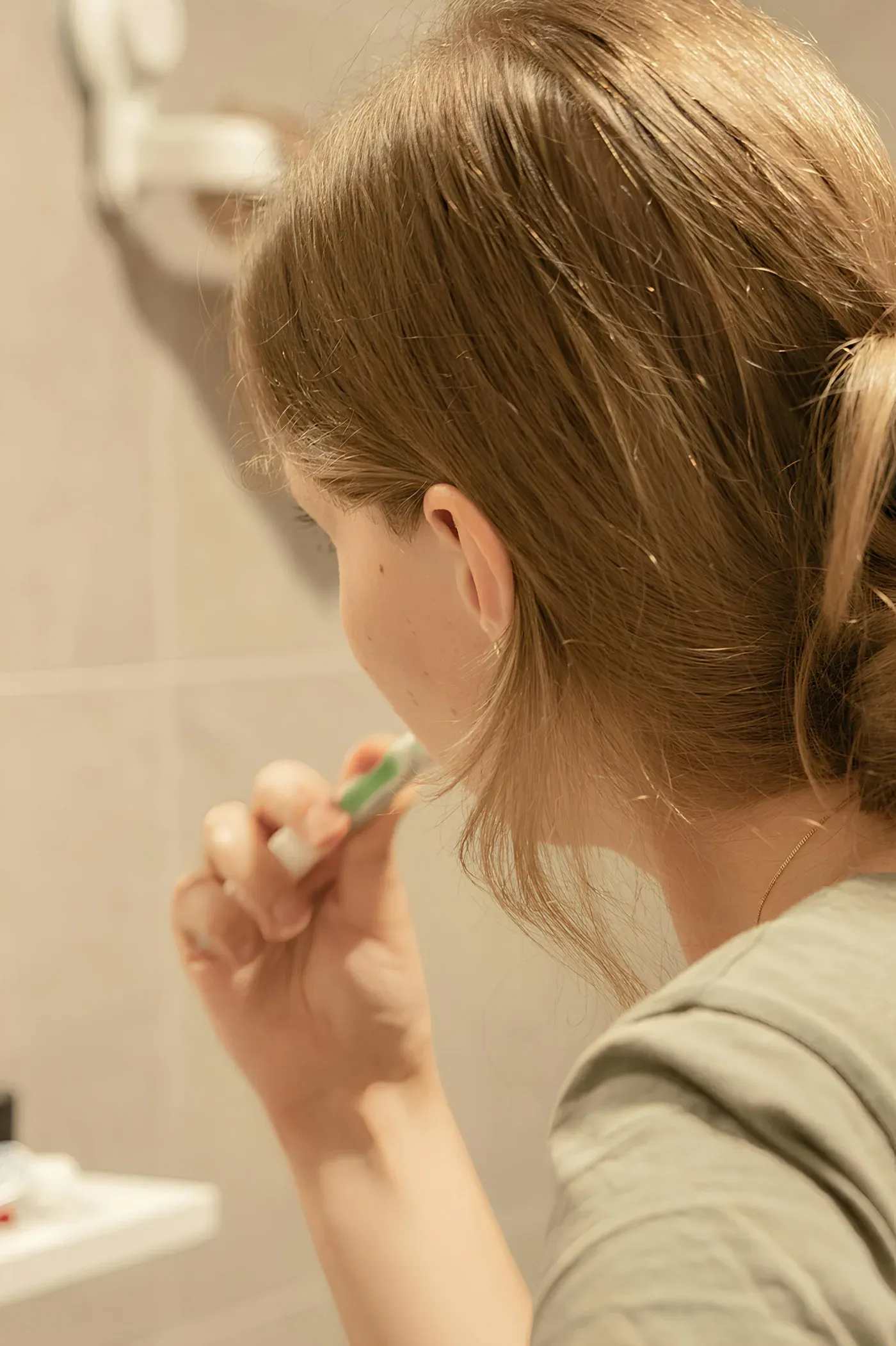 Woman brushing her teeth